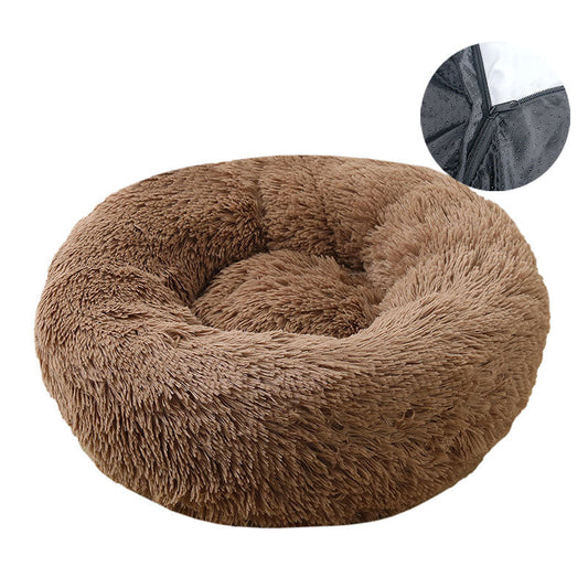 Slumber Circles brown shaggy faux fur donut bed. Features a removable zippered cover and non-slip bottom.