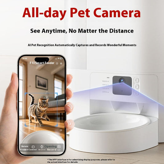 White Purrfect Pet Kingdom smart feeder with integrated camera and food bowl, shown via a smartphone app.