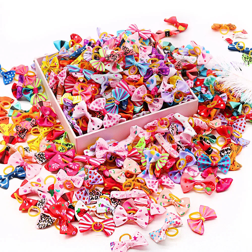 Colorful assortment of adorable pet hair bows for dogs in various patterns and sizes for stylish pets
