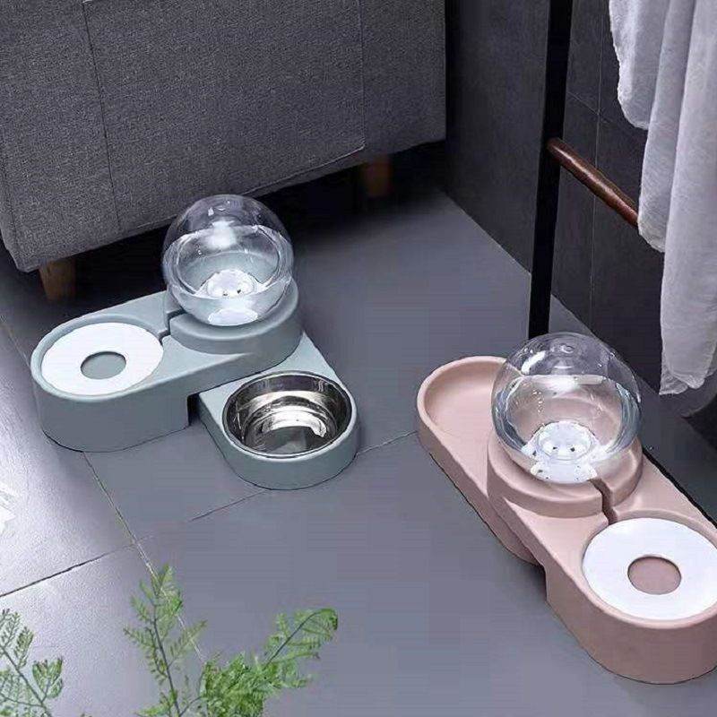 Purrfect Pet Kingdom automatic pet water fountain with dual feeding bowls in gray and pink colors