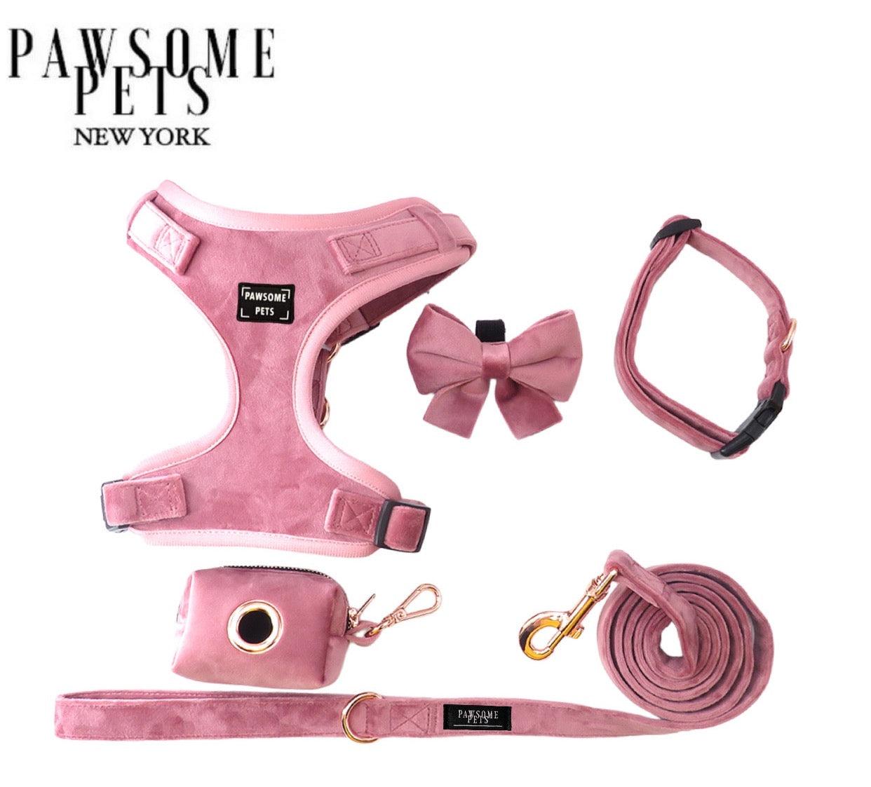 Luxury dog harness and leash set in pink with matching bow and accessory bag for stylish pets