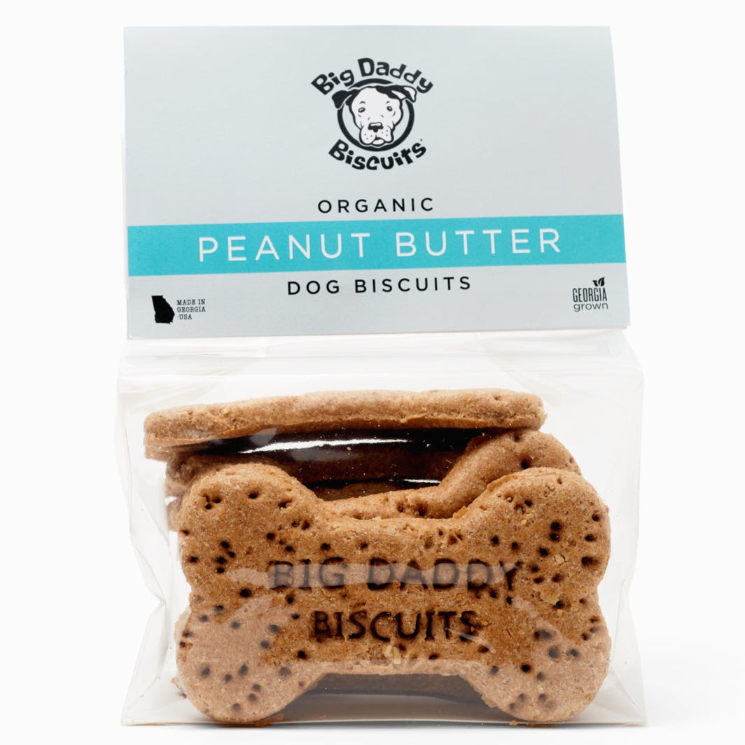 Organic peanut butter dog biscuits in a clear package, healthy dog treats for sale