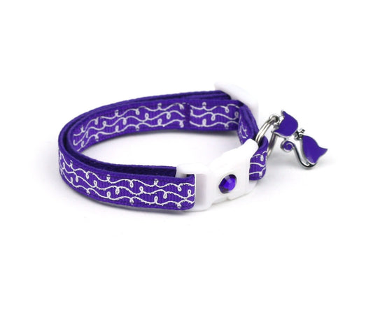 Purple Tail Chasers Cat Collar with Bell for Safety featuring a stylish design and adjustable fit