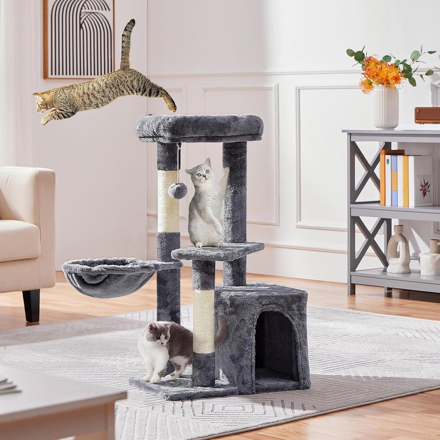 MJ's Pet Closet gray cat condo with multiple levels, scratching posts, and hanging toys for playful cats