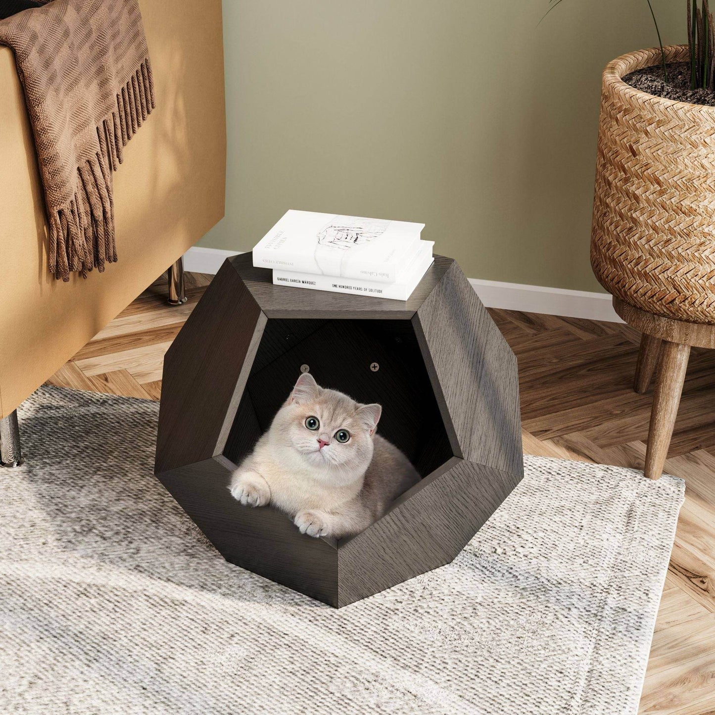 Cozy geometric cat bed from Purrfect Pet Kingdom with cat inside, ideal cat furniture for living room