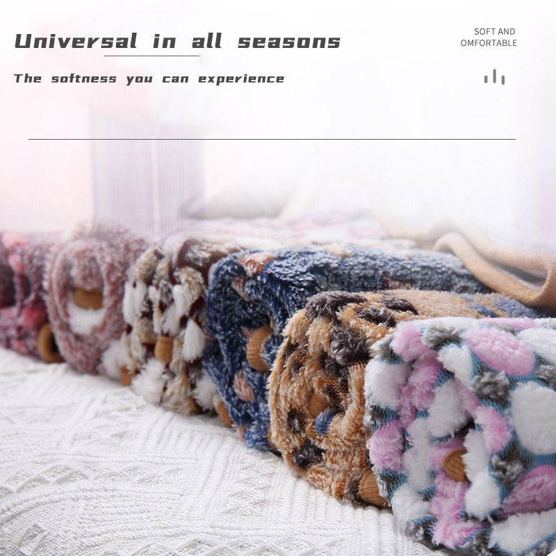 Cozy pet blanket for dogs and cats in various soft, colorful patterns from Purrfect Pet Kingdom