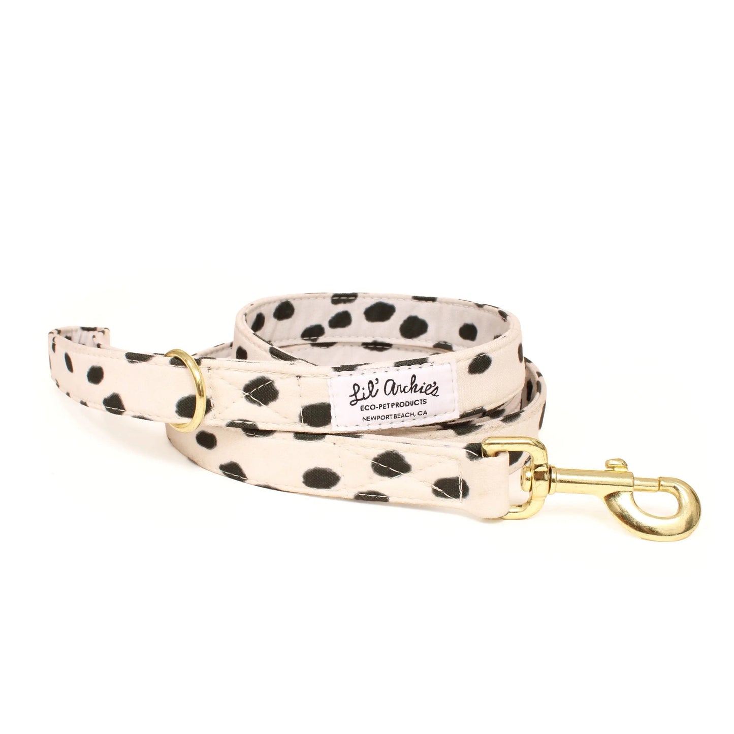 K9 Outdoors cute dog leash with polka dots in white and black with a golden clasp for stylish pet walks
