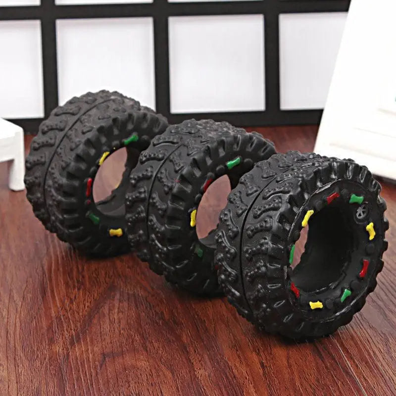 Purrfect Pet Kingdom interactive toys for dogs black textured rubber tire puzzle toys with colorful bone accents