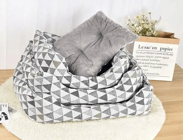 Purrfect Pet Kingdom cozy spill-resistant cat bed with gray geometric pattern and soft cushion