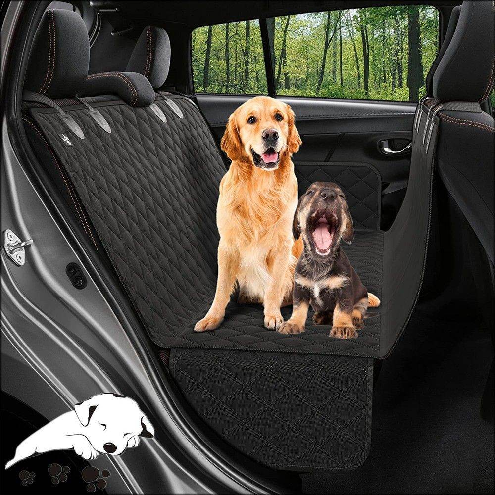 SUV dog cargo protector mat in black inside car with two dogs sitting on it protecting the back seat