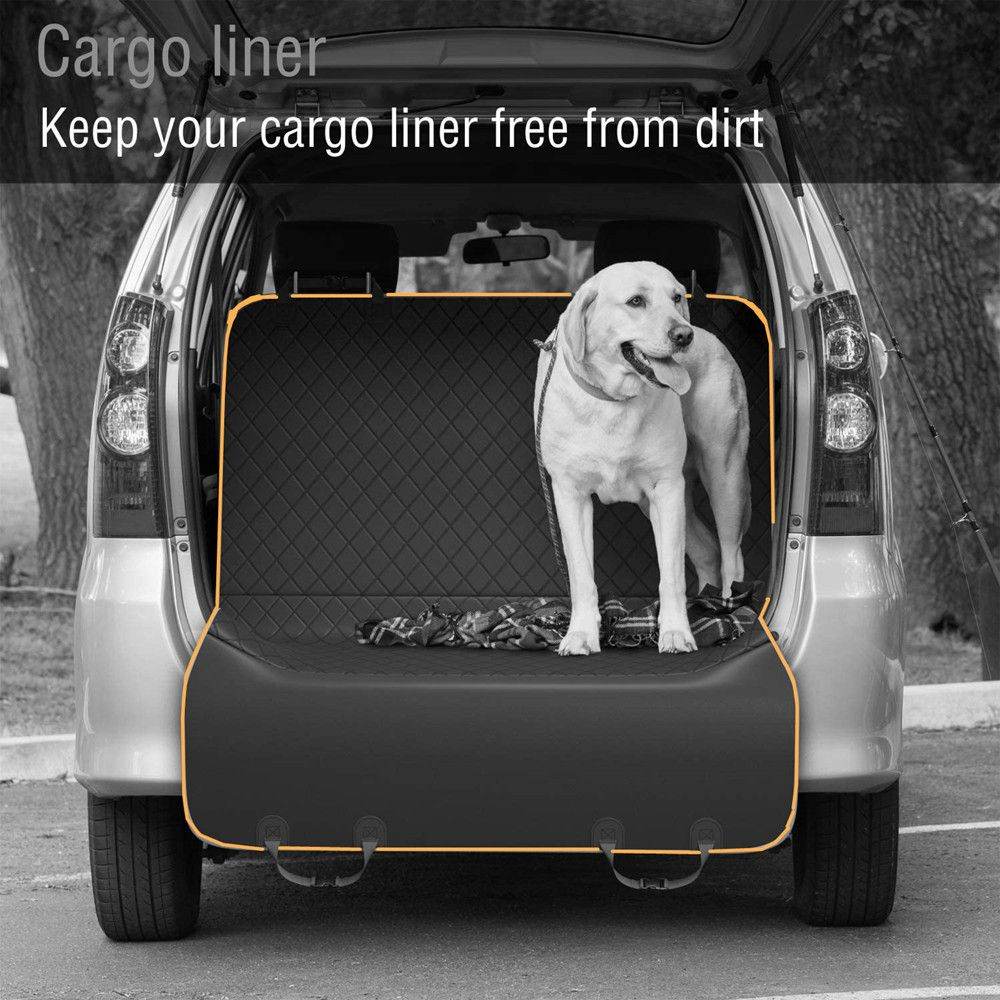 SUV dog cargo protector mat installed in the back of a vehicle with a white dog standing on it