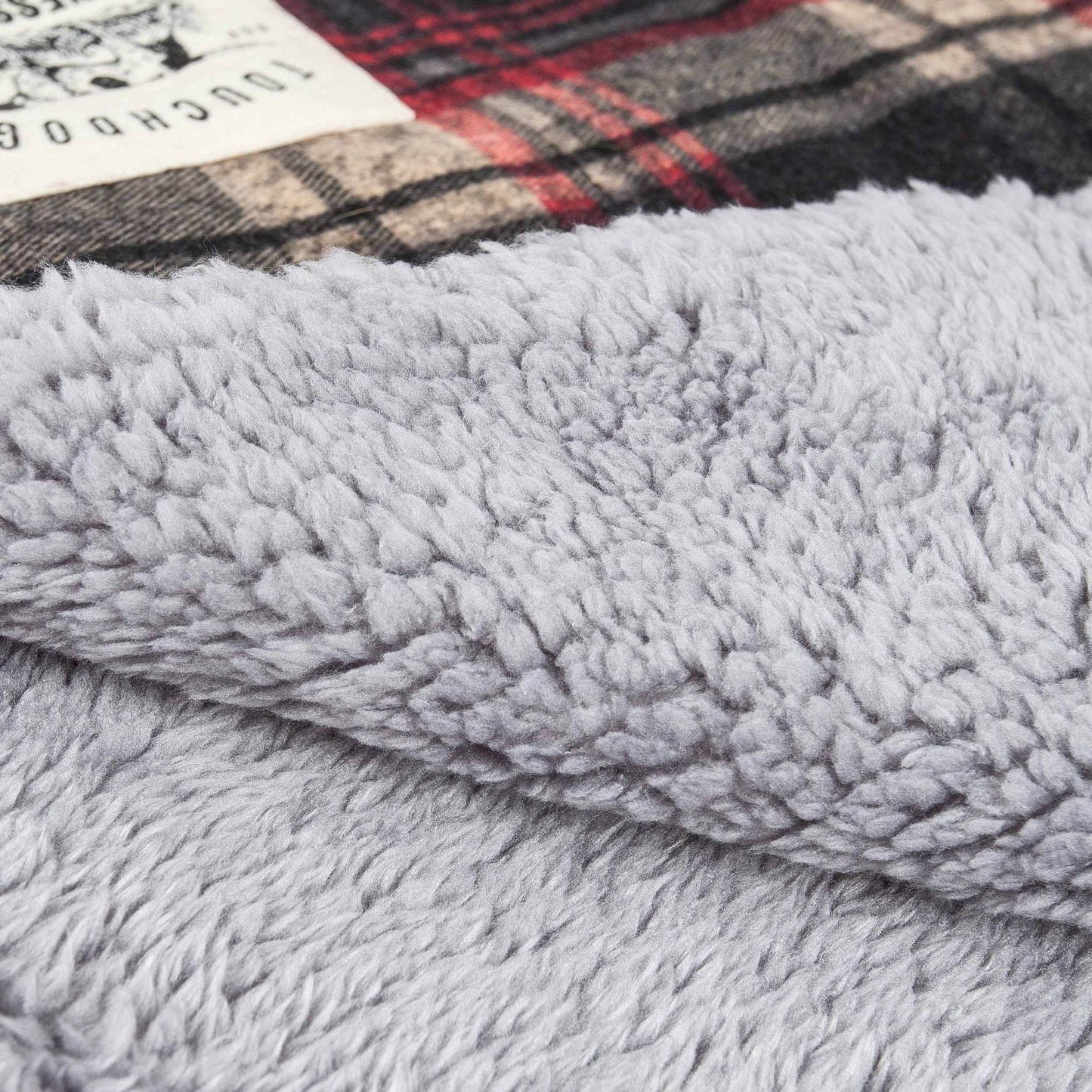 Soft fleece lining detail of Purrfect Pet Kingdom dog travel mat and jacket combo for cozy warmth