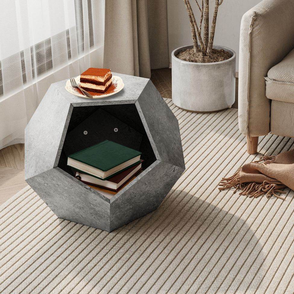 Cozy cat kennel side table with geometric design holding books and dessert in modern living room