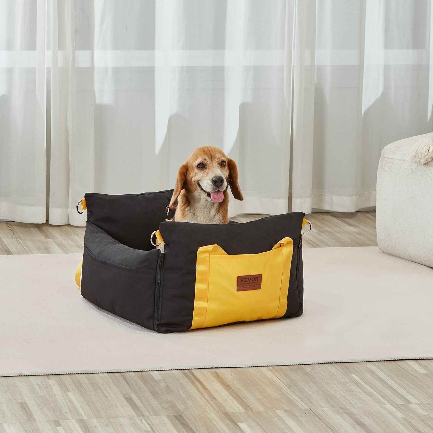 Secure dog travel seat for small pets in black and yellow with comfortable padded sides and safety rings