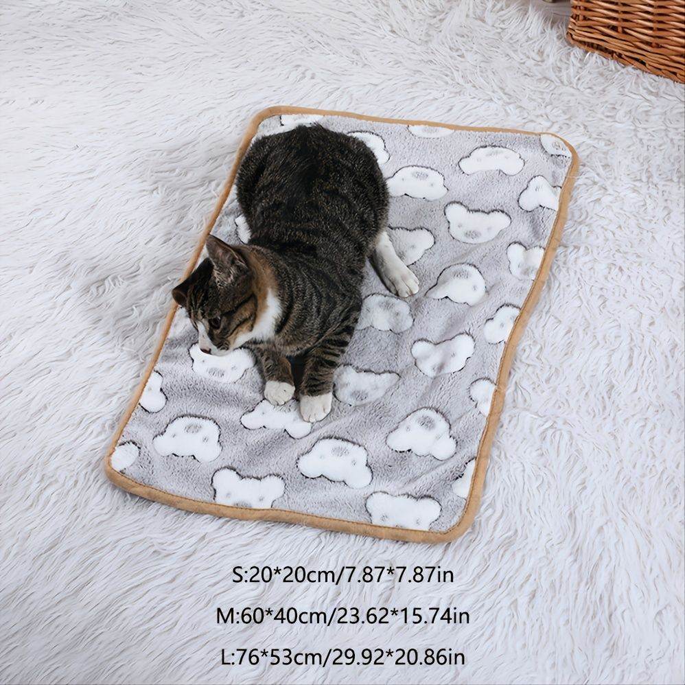 Cozy gray warming pet pad for cats and dogs with white cloud patterns and brown trim from Purrfect Pet Kingdom