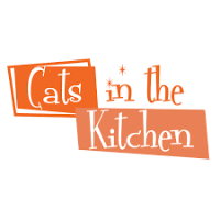 A fluffy ginger cat sits on a clean, modern kitchen countertop, surrounded by gourmet cat food and ceramic bowls.