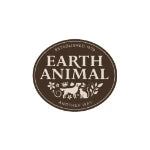 Close-up of a healthy dog in a sunlit meadow, warm natural tones, earthy greens and golden light.