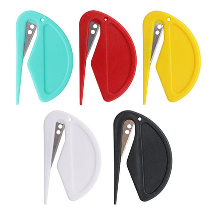 Five colorful Purrfect Pet Kingdom deshedding tools with plastic bodies and recessed metal blades for safe detangling.