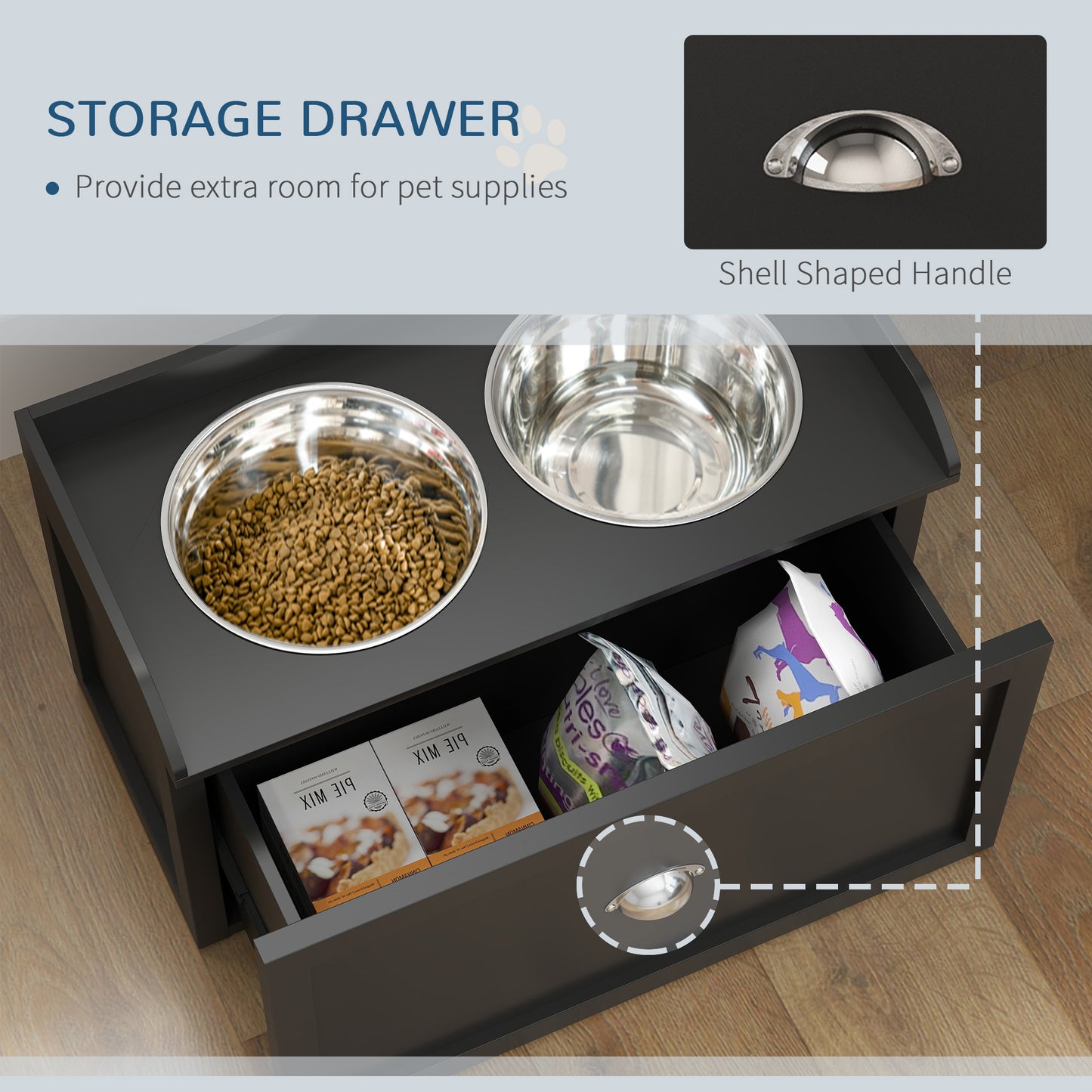 Black elevated pet feeder with 2 stainless steel bowls and a storage drawer featuring a silver shell-shaped handle.