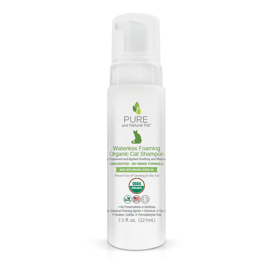 7.5oz white plastic pump bottle of PURE and Natural Pet organic waterless foaming cat shampoo with green cat logo.