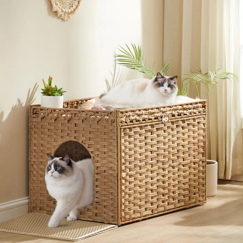 Max & Rex Boho Rattan Haven Enclosure: Tan woven litter box with arch entry and plush white top cat bed.