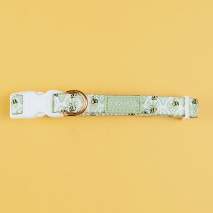 Little Honey Padded Neoprene Dog Collar Adjustable Polyester: Mint green bee print, white buckle, and gold D-ring.