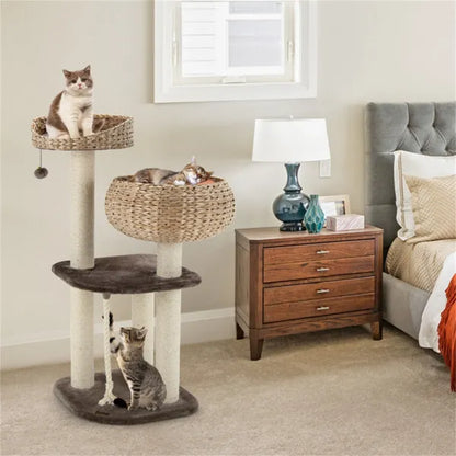 Purrfect Pet Kingdom 41-inch brown woven hyacinth cat tree with multi-level baskets, sisal posts, and three cats.