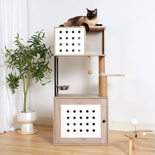 HouseOfZazla modern light wood cat tree with litter box enclosure, clear hammock, and Siamese cat on the top level.