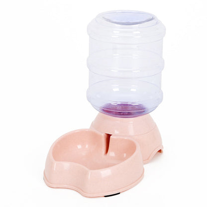 Estely pink automatic gravity pet water dispenser with clear tank and heart-shaped drinking bowl.