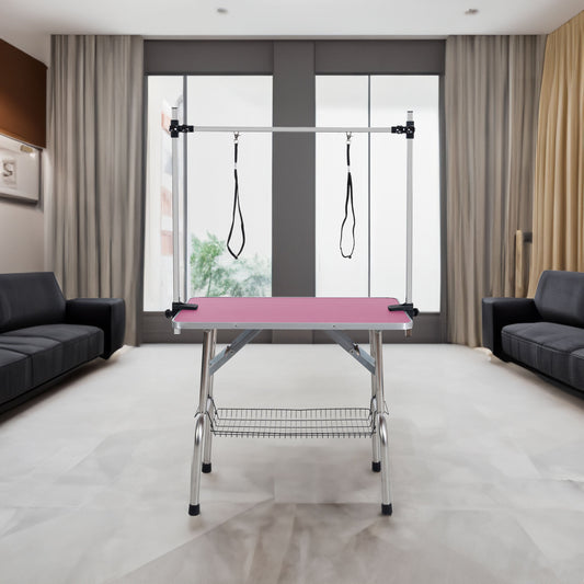 36 inch folding pet grooming table with adjustable arm and straps in a modern space