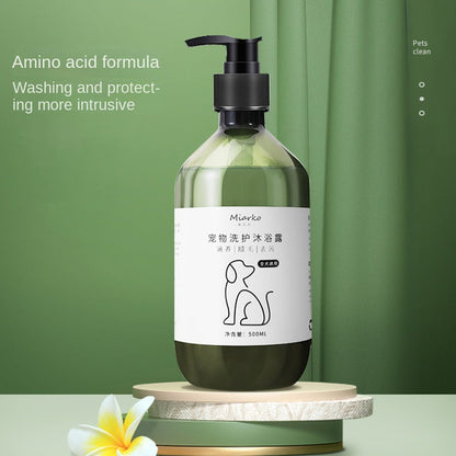 Purrfect Pet Kingdom green pet shampoo bottle with black pump on stone tiers. 500ml amino acid formula for fresh coats.