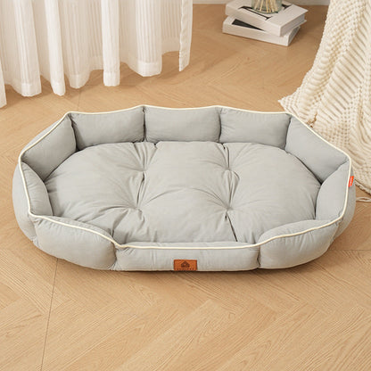 Gray Purrfect Pet Kingdom orthopedic memory foam pet nest with tufted cushion and raised bolsters.