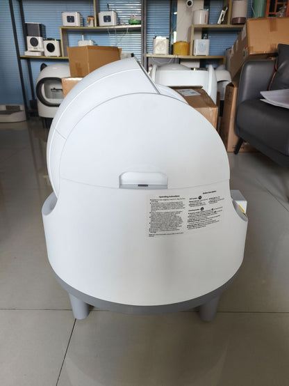 White and grey dome-shaped Purrfect Pet Kingdom smart automatic self-cleaning cat litter box on four short legs.