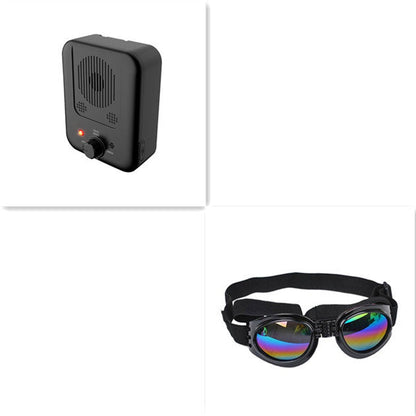 Purrfect Pet Kingdom ultrasonic bark device and dog goggles with rainbow lenses and adjustable black strap.