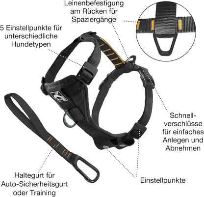 Black K9 Outdoors Tru-Fit dog harness with padded chest, adjustable nylon straps, quick-release buckles, and tether.