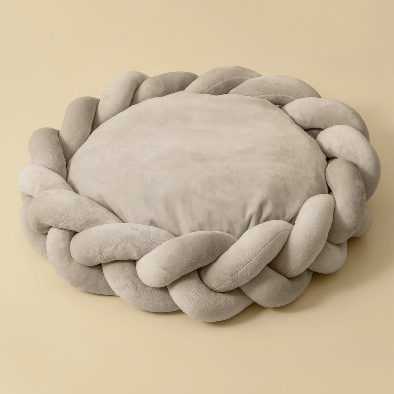 Grey velvet plush Purrfect Pet Kingdom Slumber Circle featuring a braided bumper and soft round cushion.