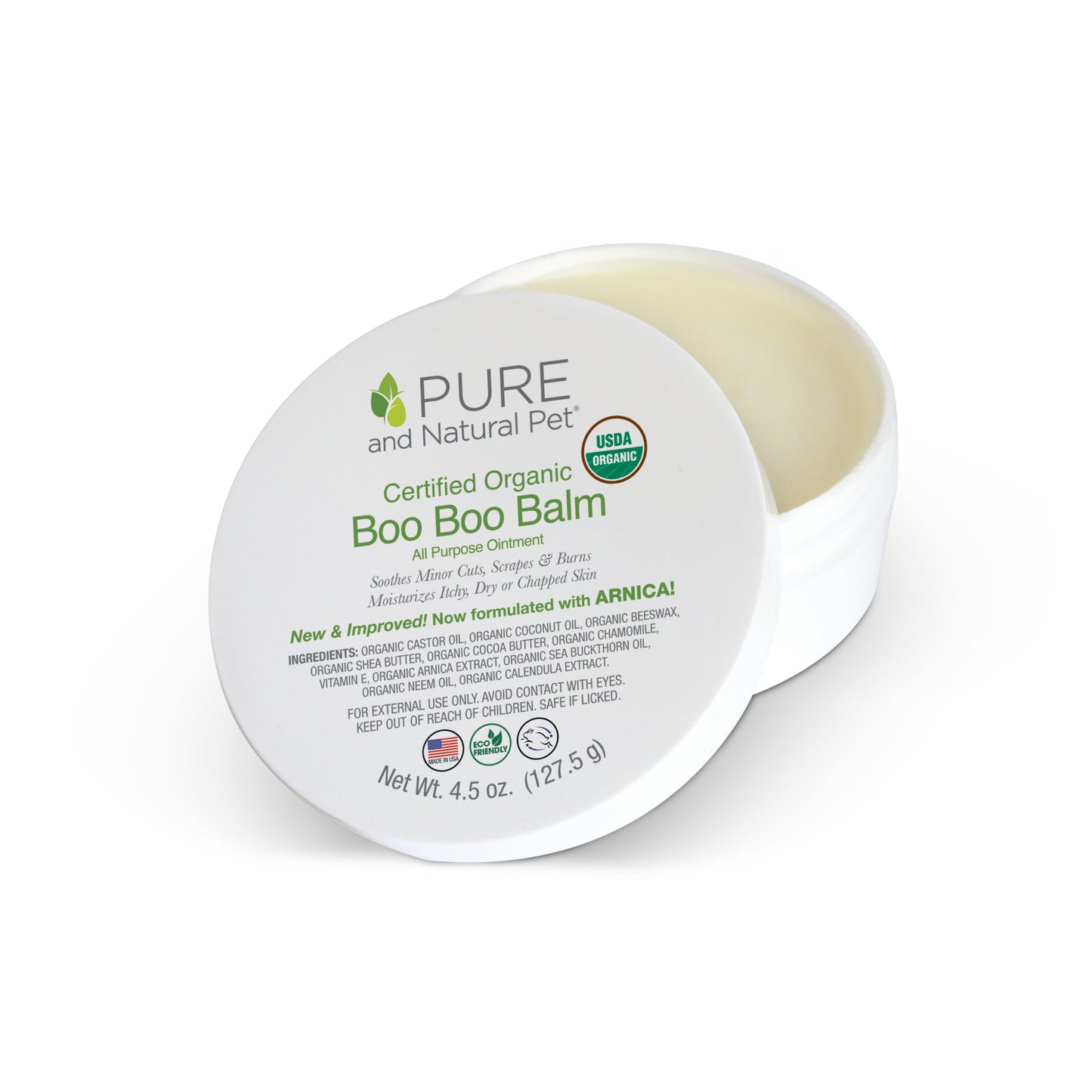 White jar of organic Boo Boo Balm for dogs, propped lid showing green text and USDA Organic seal.