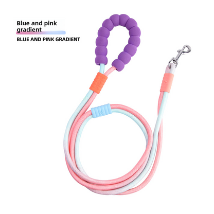 LeonaJ K-9 Co. blue and pink gradient dual crossbody rope dog leash with purple foam handle and metal clip.