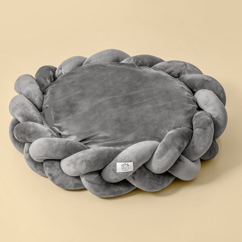 Grey Purrfect Pet Kingdom plush donut bed featuring a thick braided velvet border and soft Slumber Circle center.