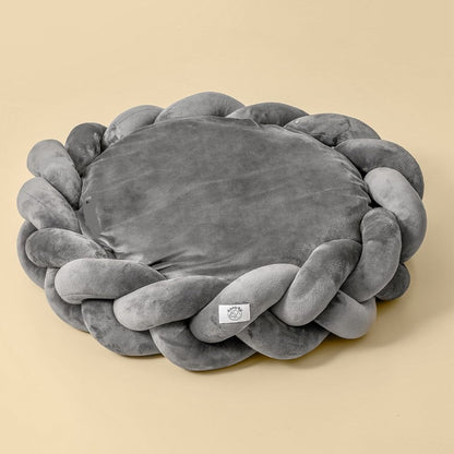Grey Purrfect Pet Kingdom plush donut bed featuring a thick braided velvet border and soft Slumber Circle center.