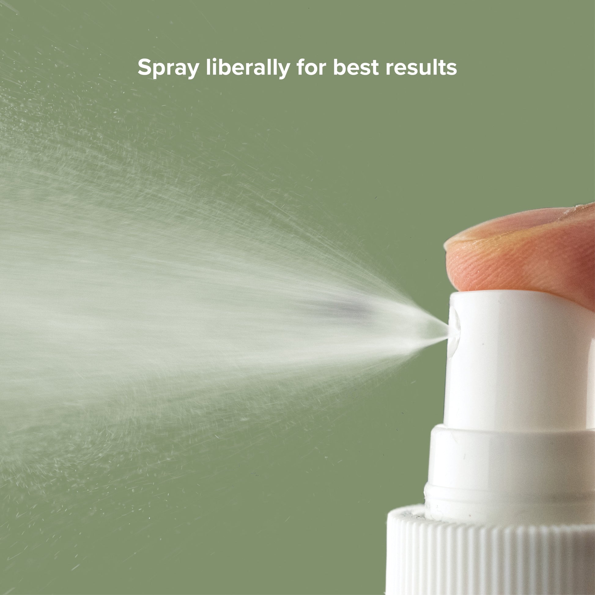 White plastic nozzle emitting a fine mist on a sage green background. Text: Spray liberally for best results.
