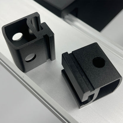 Black matte hardware connectors for the Purrfect Pet Kingdom Arctic Retreats cooling bed frame on a silver track.