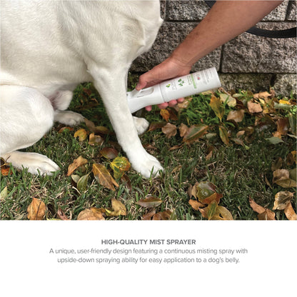 Purrfect Pet Kingdom Natural Flea and Tick Spray being applied to a white dog's leg with a white mist sprayer bottle.