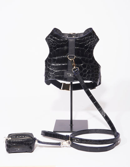 BESPOKE PAWS black alligator leather dog leash and harness set with gold hardware and a matching zippered pouch.