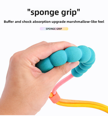 Teal sponge grip on pink and yellow LeonaJ K-9 Co. dual crossbody rope leash for shock absorption.