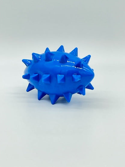 Blue Spikez the Ball dog toy by Toys N Treats Box. Glossy, spiky rubber football-shaped toy.