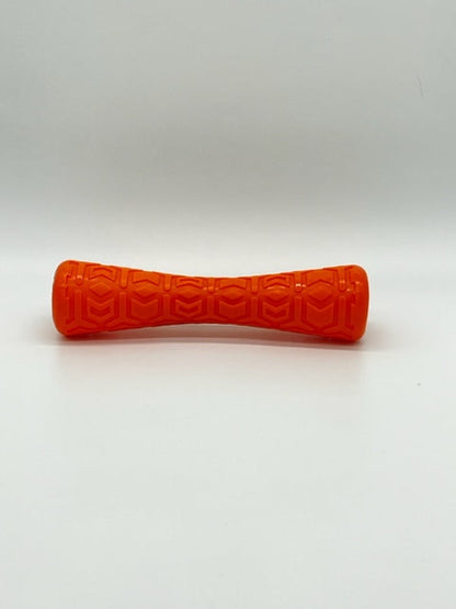 Toys N Treats Box Durable Dog Batton: bright orange textured rubber toy with a geometric pattern.