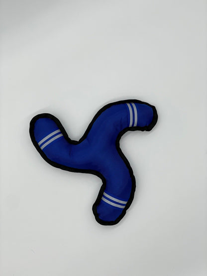 Blue Ruff N Tuff Boomerang dog toy with three arms, black reinforced edges, and gray reflective stripes.