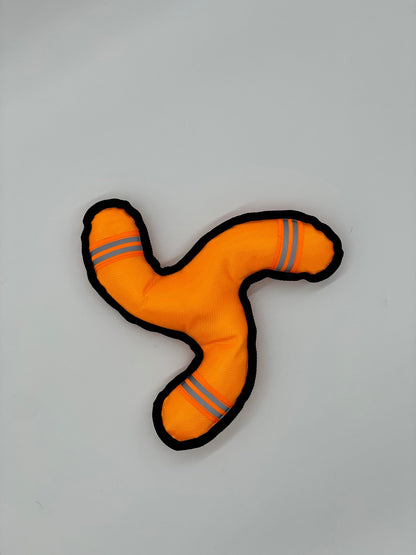 Toys N Treats Box Ruff N Tuff Boomerang: Orange nylon dog toy with black trim and reflective stripes on three arms.