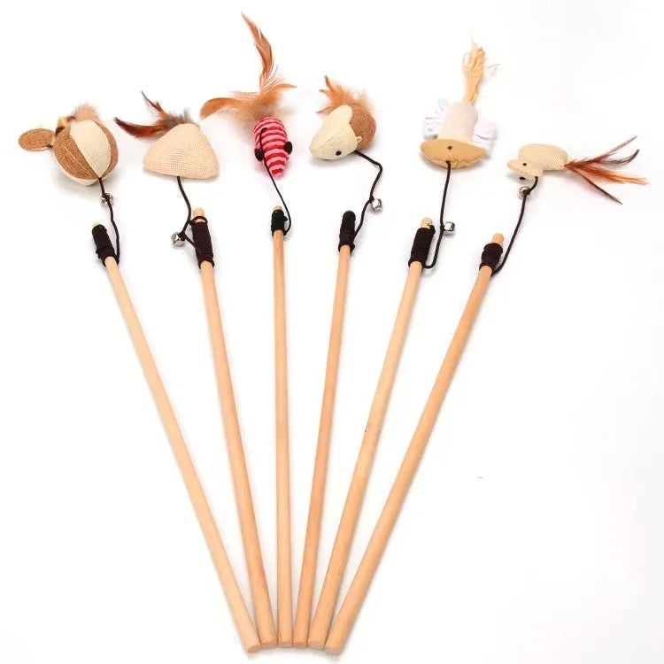 Toys N Treats Box wooden cat teaser wands with burlap mice, bird toys, feathers, bells, and elastic strings.